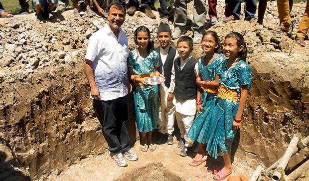 Children lay the cornerstone of the new J & K Village