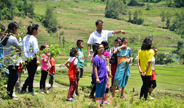 Kids at the site of the future J & K Village.