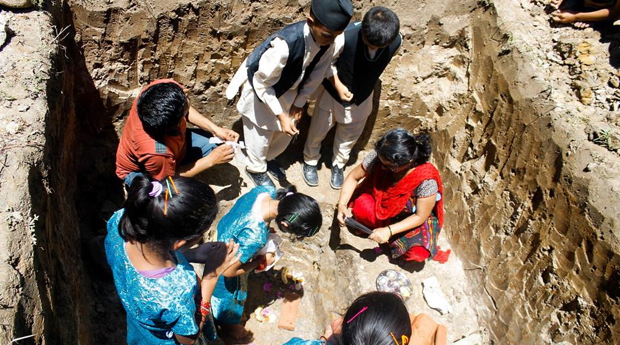 Laying the corerstone at the new J & K Village