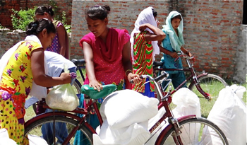 Raj Kumari with flood relief supplies