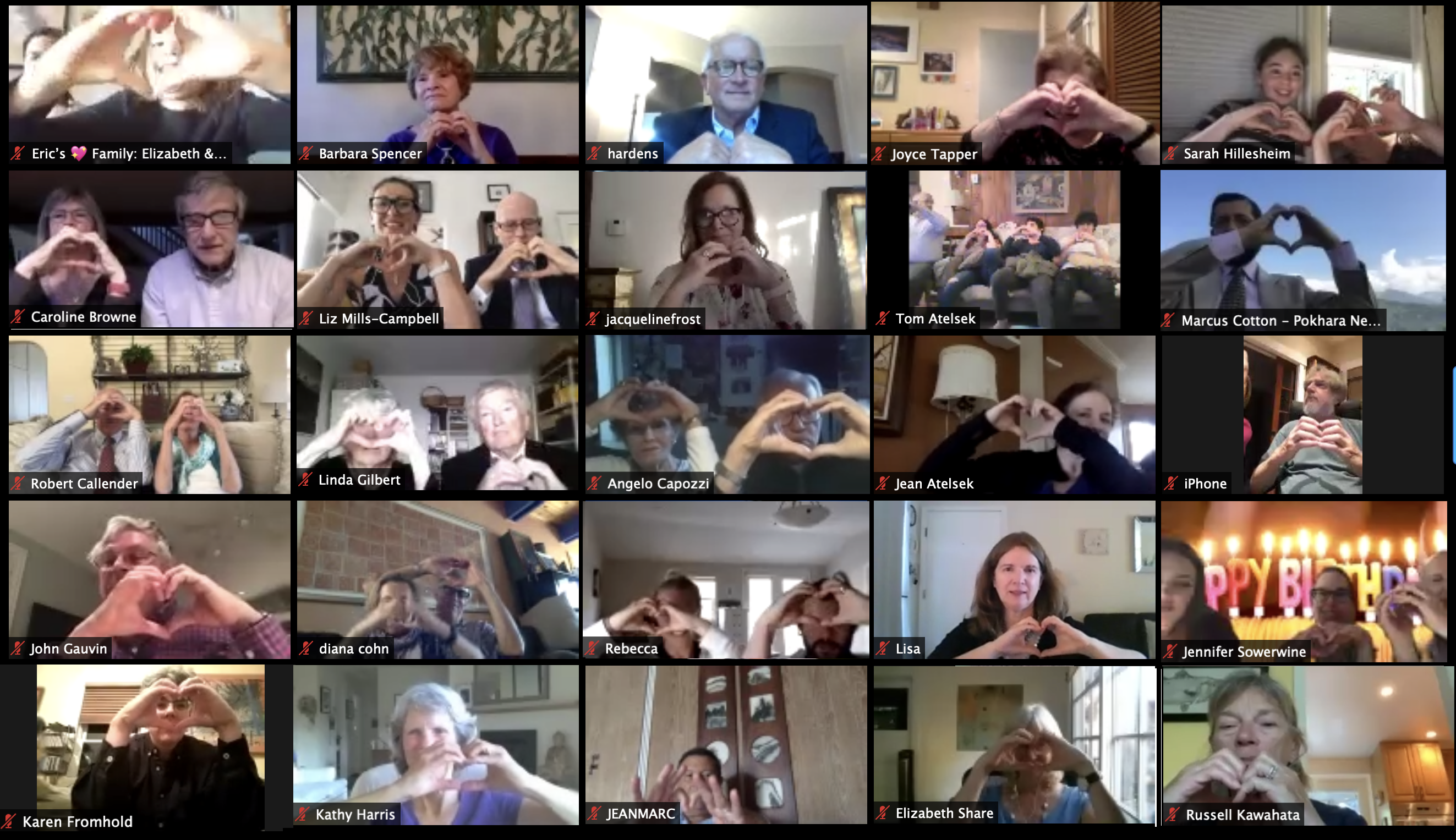 Founder's Day participants around the world share an onscreen #LoveWorks moment by shaping their hands in the shape of a heart.