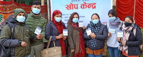 Vaccines arrive in Nepal! In early February 2021, our Nutritional Rehabilitation Home staff
members display their new COVID vaccine cards.