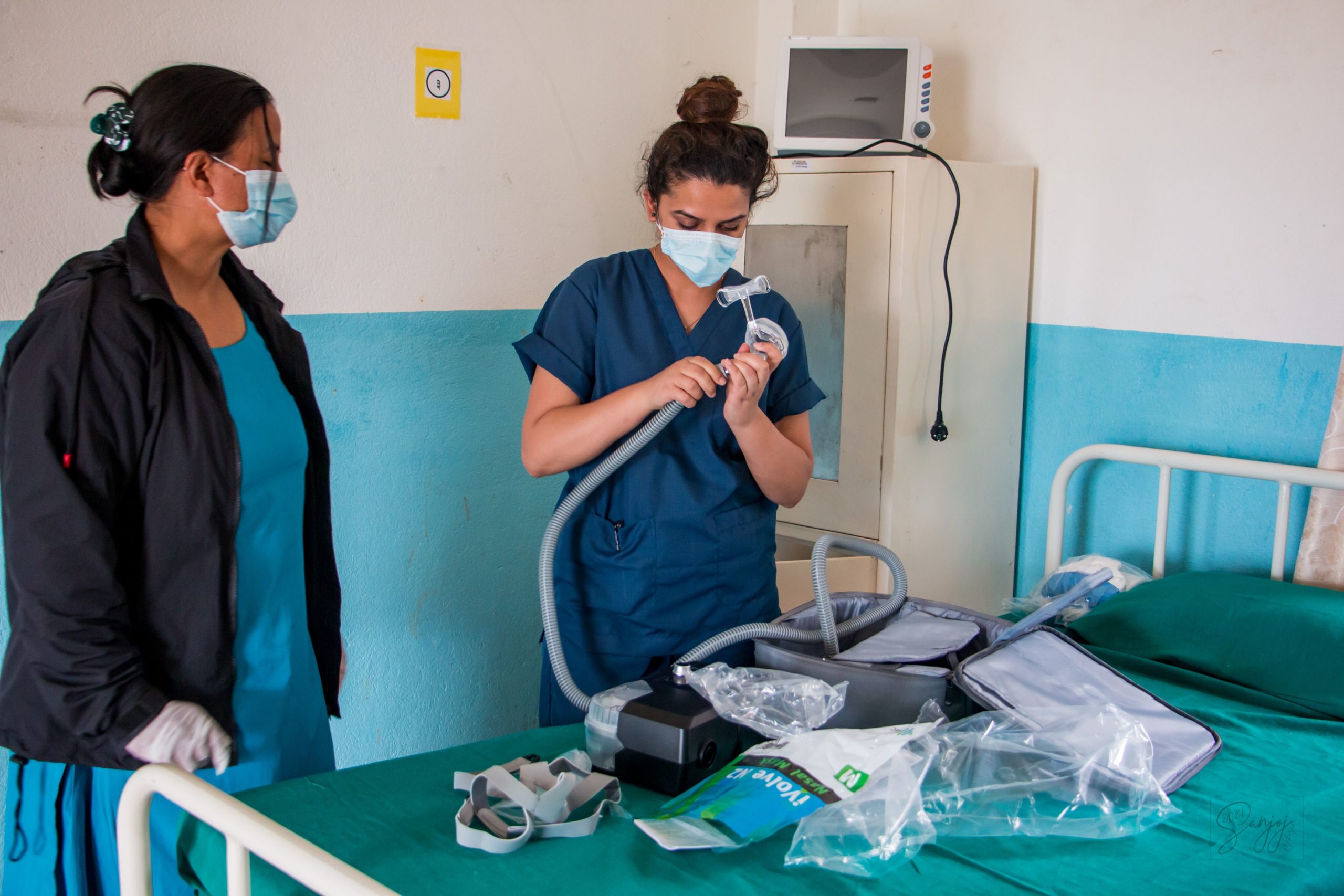 NYF staff members stock the new high-dependency unit with important equipment.