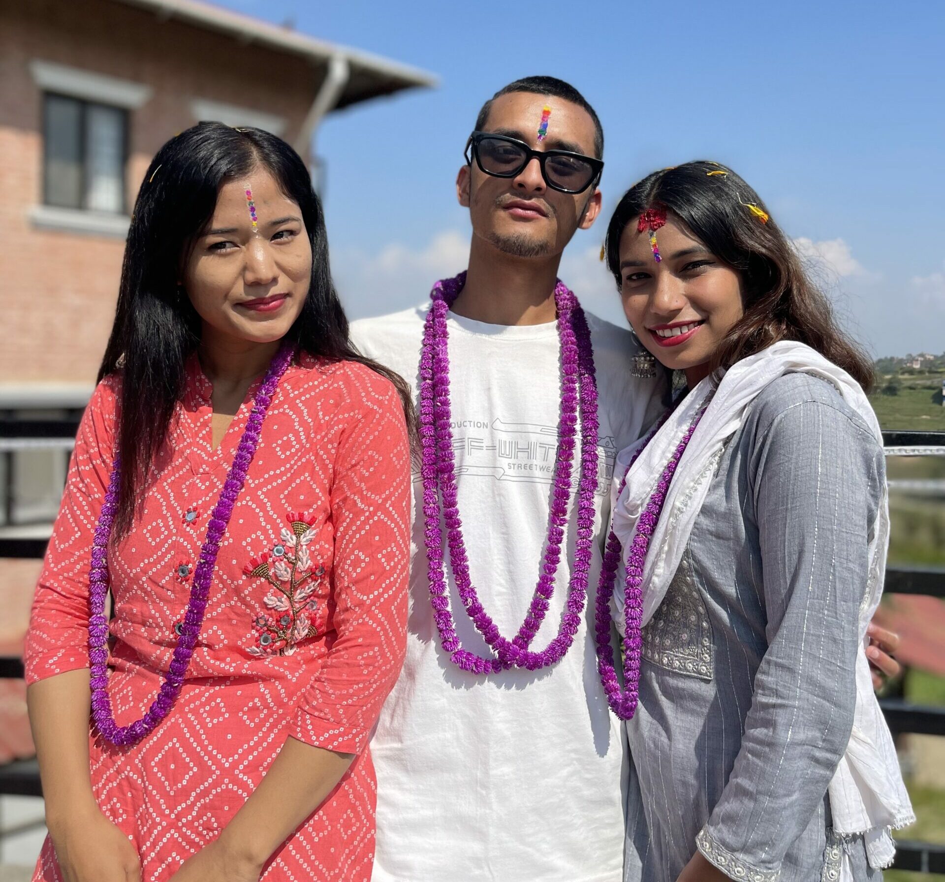 Three Olgapuri graduates have returned to the campus this year to celebrate Tihar. They all have tikas on their foreheads!