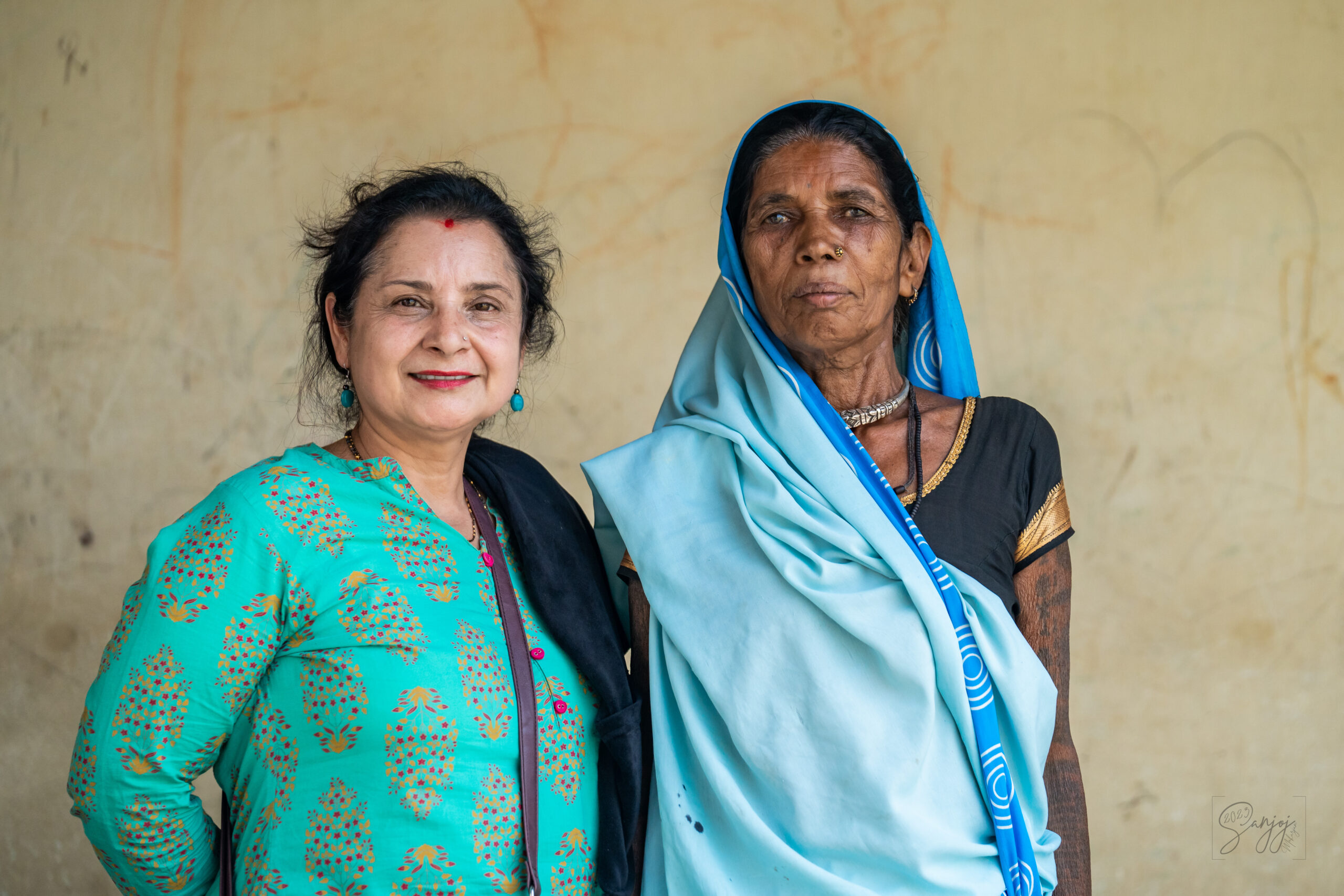 Sunita Rimal, NYF's Nutrition Coordinator, with a community member in Saptari District during a nutrition outreach camp earlier in 2023.